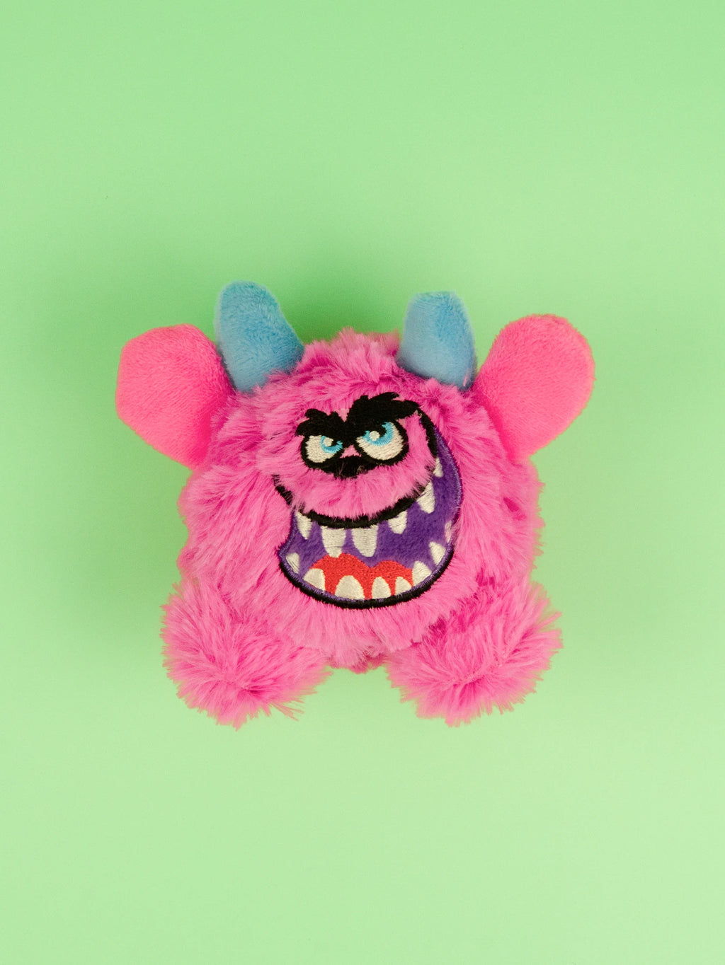 Jouet en peluche petit monstre pour chien qui couine